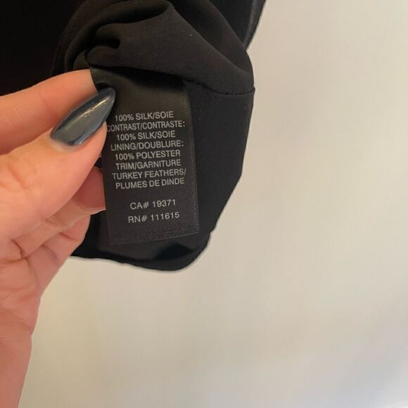 Robbi and Nikki black top with beautiful details - Picture 2 of 4